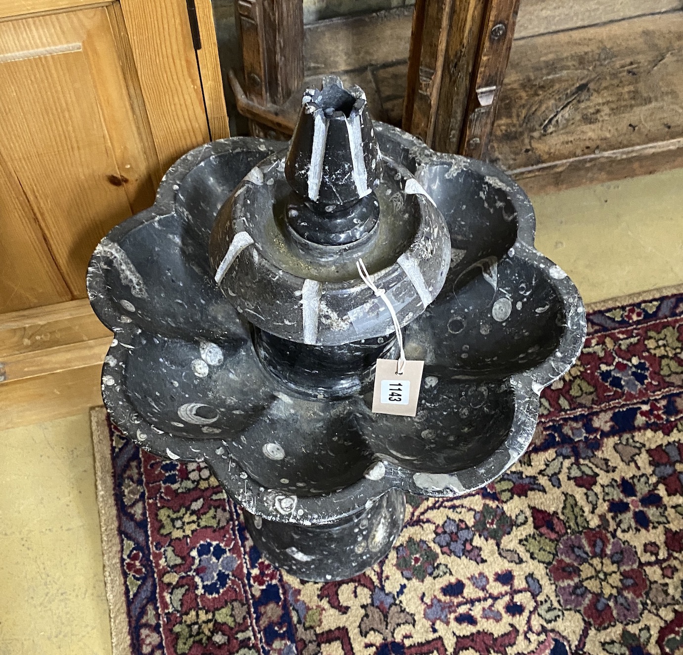 A small marble and fossil fountain, height 65cm